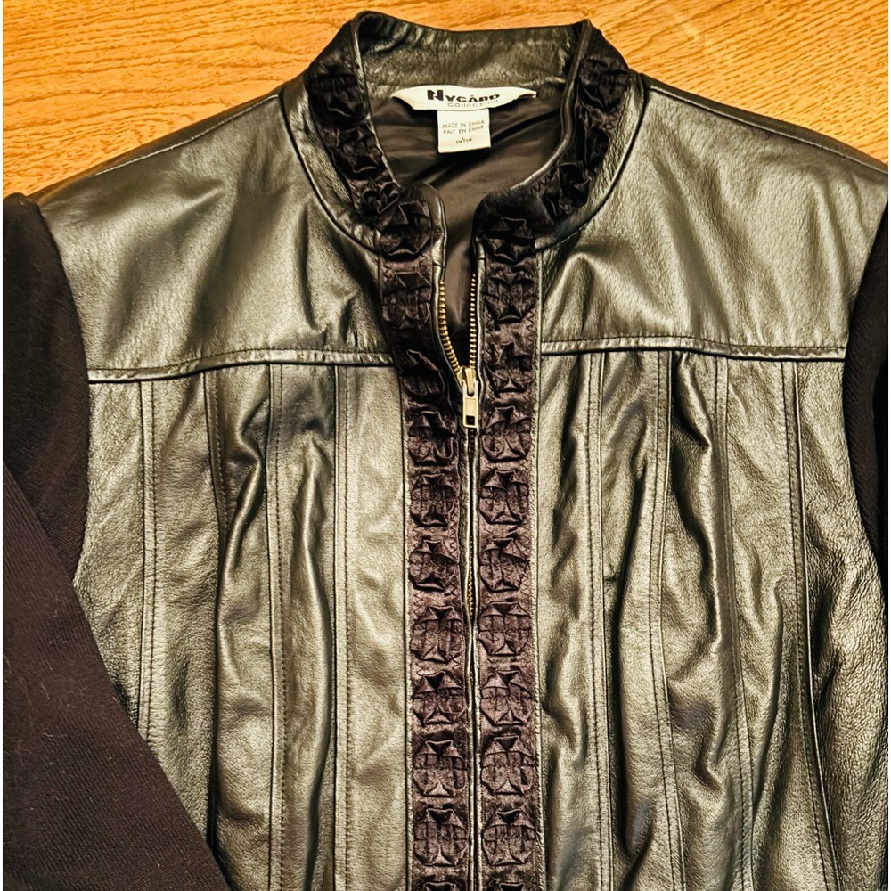 Leather/knit zip-up jacket.